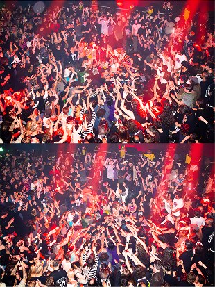 Crowd under red light, London