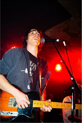 Guitarist under red light